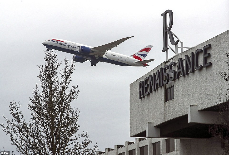 39293692-9261439-A_plane_flies_over_the_Renaissance_Hotel_near_Heathrow_Airport_a-a-18_1613378691322.jpg