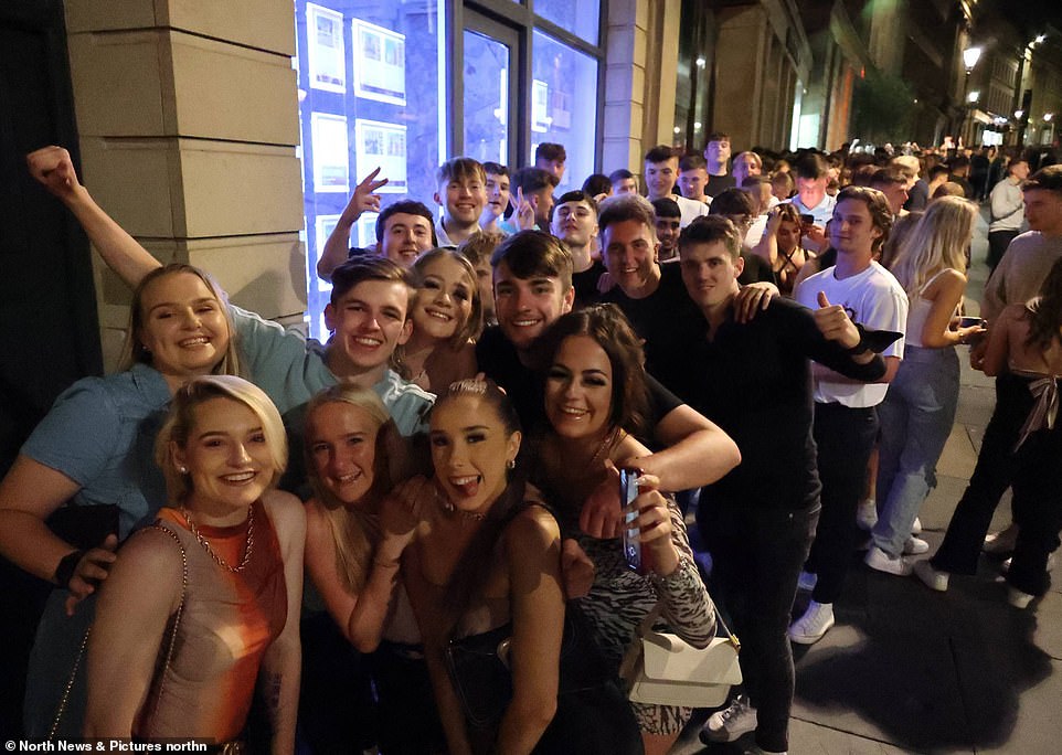 45601107-9800683-Huge_queues_of_revellers_waited_to_enter_Grey_s_nightclub_on_Gre-m-127_1626652498289.jpg