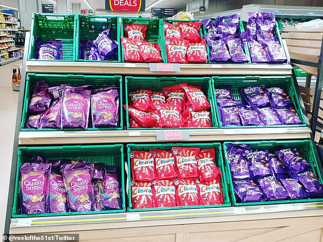 49161259-10093659-Supermarkets_have_been_mocked_for_filling_gaps_on_shelves_with_b-a-97_1634249898864.jpg