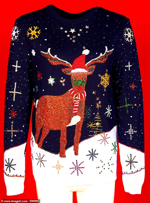 51358425-10276895-The_world_s_most_expensive_Christmas_jumper_which_has_been_encru-m-42_1638703856077.jpg